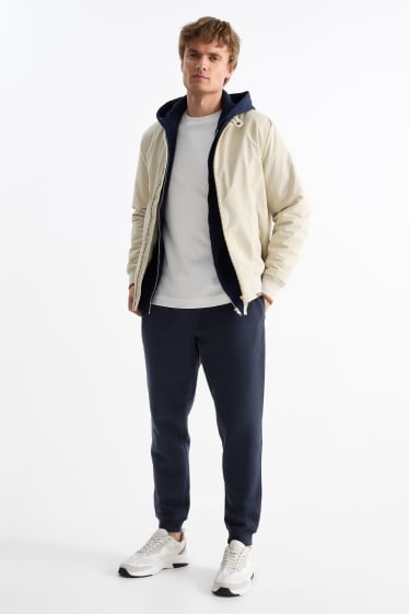 Pánské - Teplákové kalhoty - tmavomodrá