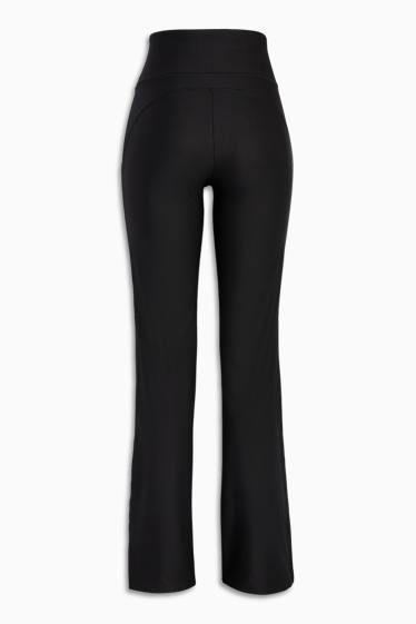 Kobiety - Funkcyjne legginsy flared - 4 Way Stretch - czarny