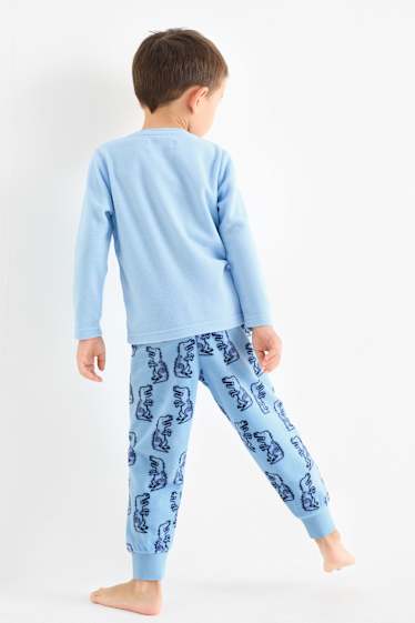 Kinderen: jongens - Dinosaurus - fleece pyjama - lichtblauw