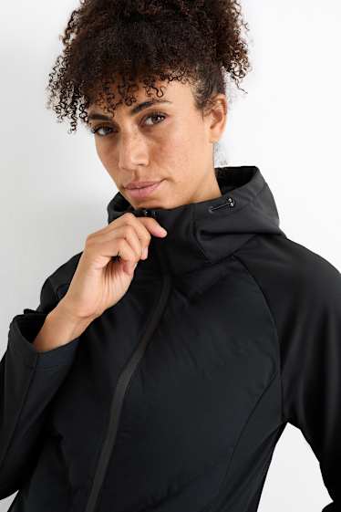 Damen - Thermo-Softshelljacke mit Kapuze - wasserdicht - gesteppt - schwarz
