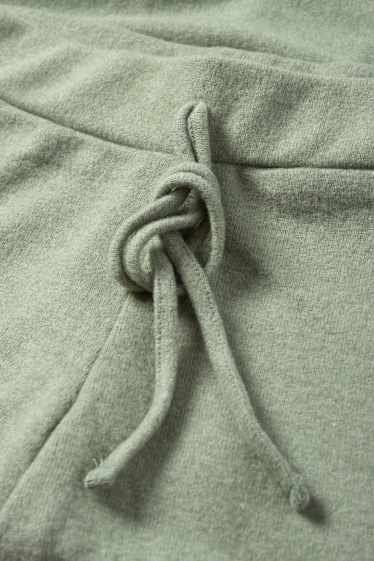 Damen - Flared Leggings - grün