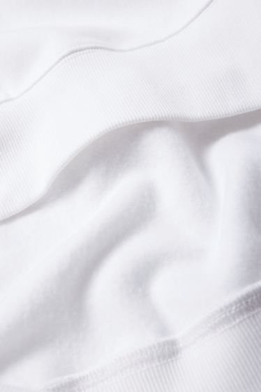 Home - Dessuadora oversized - blanc