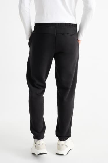 Hommes - Pantalon de jogging - noir