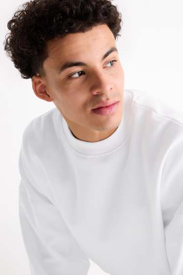 Home - Dessuadora oversized - blanc