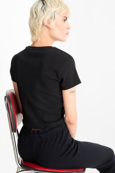 Dona - Samarreta crop de màniga curta - negre