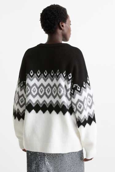 Damen - Pullover mit Strasssteinen - gemustert - schwarz / weiß