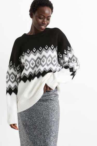 Damen - Pullover mit Strasssteinen - gemustert - schwarz / weiß
