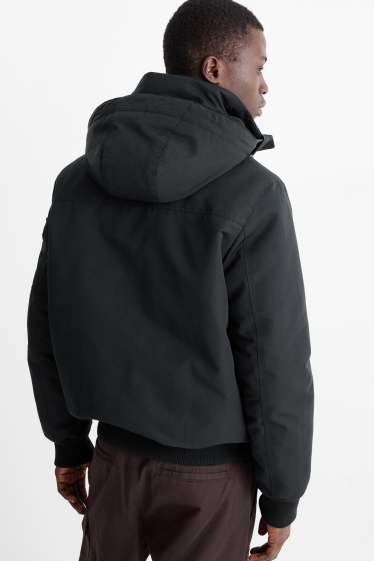 Uomo - Giaccone con cappuccio - idrorepellente - nero