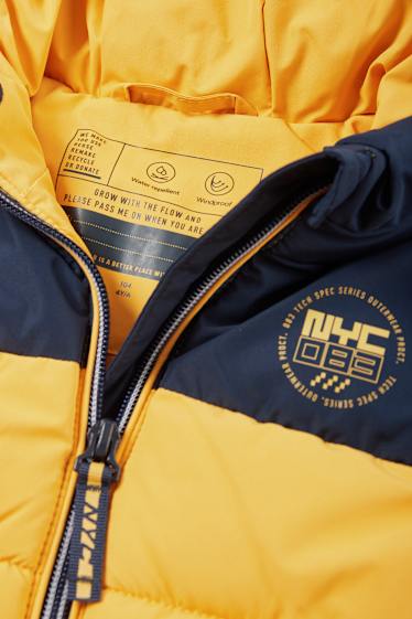 Nen - Armilla embuatada amb caputxa - impermeable - groc