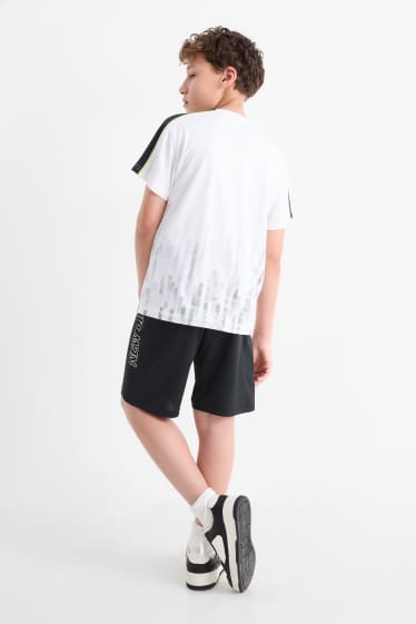 Kinderen: jongens - Set - sportshirt en -shorts - 2-delig - wit / zwart