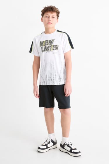 Kinderen: jongens - Set - sportshirt en -shorts - 2-delig - wit / zwart