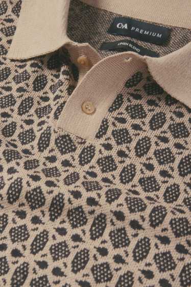 Men - Knitted polo shirt - patterned - black / beige
