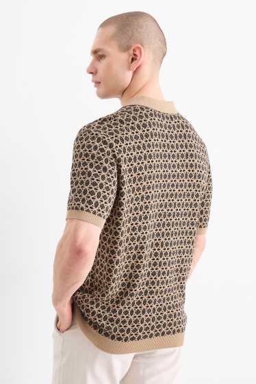 Men - Knitted polo shirt - patterned - black / beige