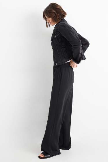 Women - Cloth trousers - high waist - wide leg - black