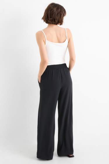 Women - Cloth trousers - high waist - wide leg - black