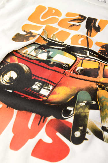 Bambini - Skateboard e autobus - maglia a maniche corte - bianco