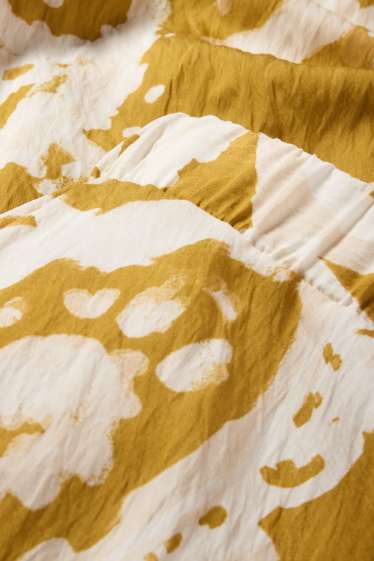 Women - Skirt - patterned - mustard yellow