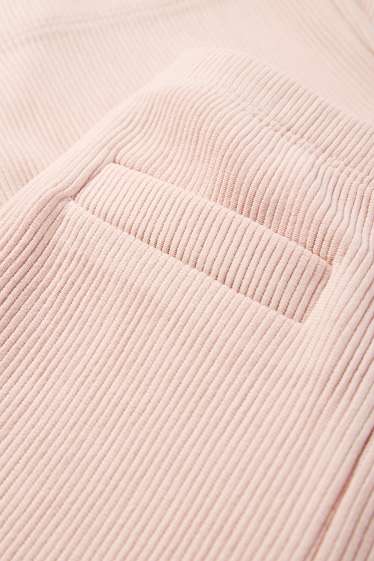 Kinderen: meisjes - Flared legging - geribd - roze