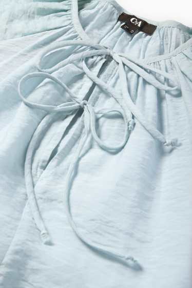 Women - V-neck blouse - light blue