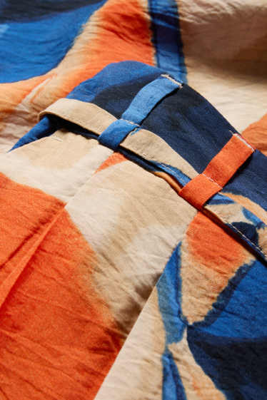 Dames - Pantalon - high waist - wide leg - met patroon - oranje / blauw