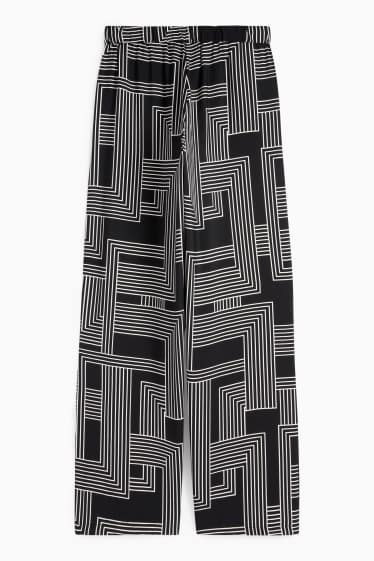 Women - Cloth trousers - high waist - wide leg - patterned - black / white