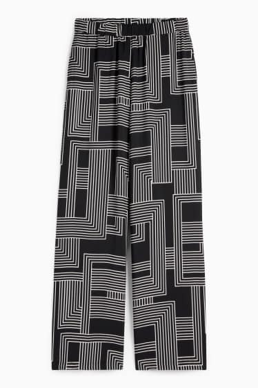 Women - Cloth trousers - high waist - wide leg - patterned - black / white