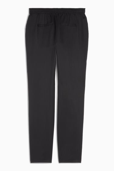 Women - Cloth trousers - mid-rise waist - tapered fit - black