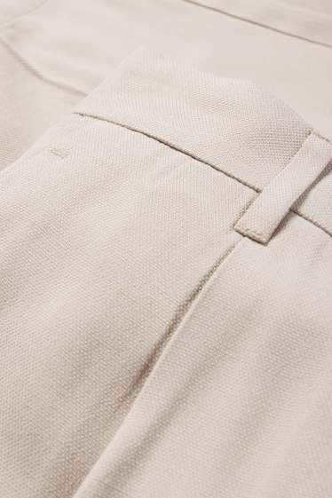 Women - Cloth trousers - high waist - tapered fit - light beige