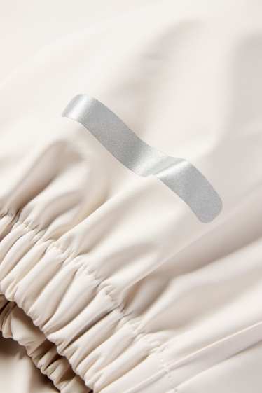 Baby: meisjes - Baby-regenbroek - waterdicht - licht beige