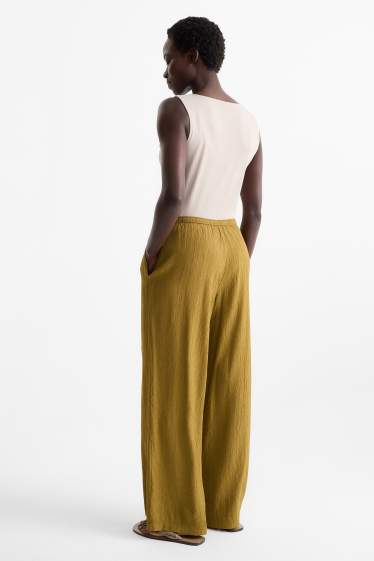 Donna - Pantaloni - vita media - gamba ampia - giallo senape