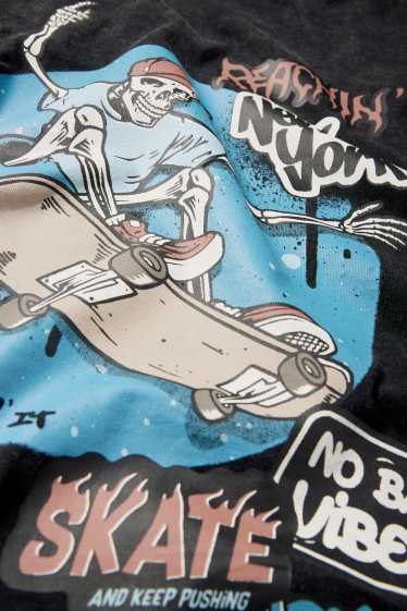 Kinderen: jongens - Skelet op skateboard - T-shirt - zwart