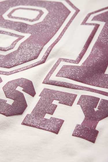 Kinderen: meisjes - T-shirt - glanseffect - crème wit