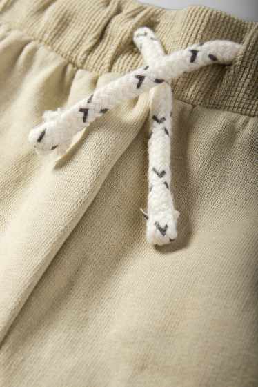 Baby: jongens - Babyjoggingbroek - beige