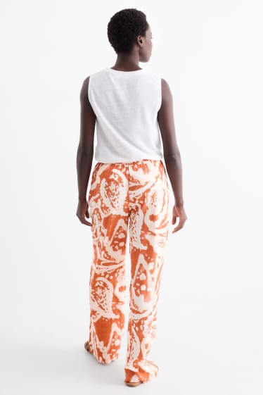 Women - Cloth trousers - mid-rise waist - palazzo - patterned - dark orange