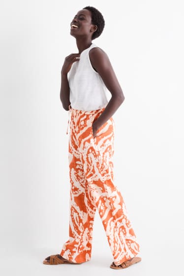 Women - Cloth trousers - mid-rise waist - palazzo - patterned - dark orange