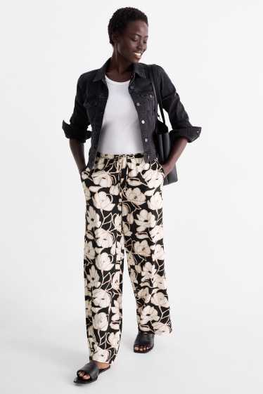 Dames - Pantalon - mid waist - palazzo - gebloemd - zwart / beige