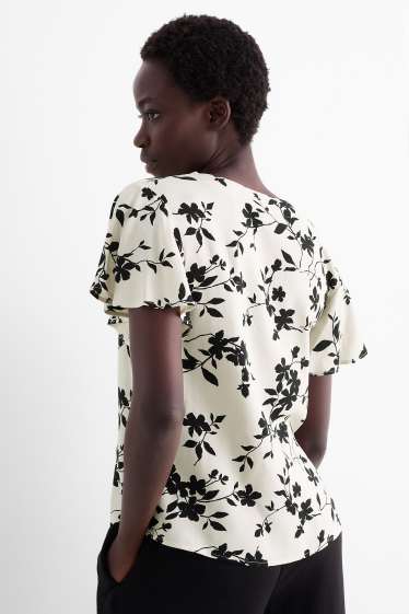 Damen - Bluse mit Volants - geblümt - schwarz / beige