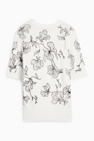 Femmes - Pull en maille - manches courtes - à fleurs - blanc / noir