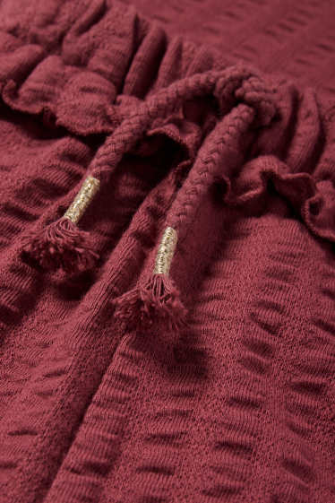 Kinderen: meisjes - Jersey broek - met structuur - roestbruin