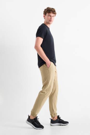 Herren - Funktions-Jogginghose - beige