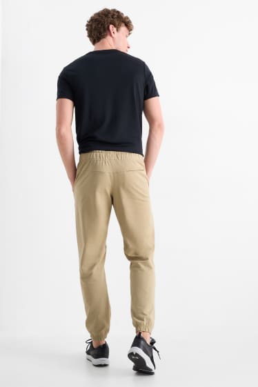Herren - Funktions-Jogginghose - beige