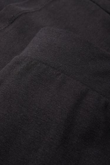 Kinderen: meisjes - Set van 2 - flared legging - zwart