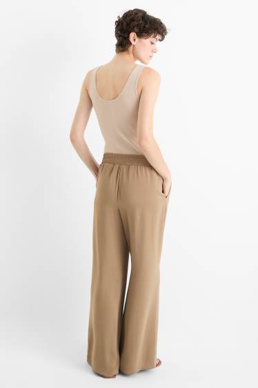 Women - Cloth trousers - high waist - wide leg - light brown