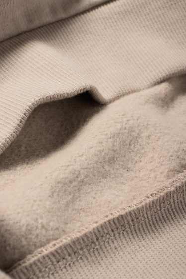 Kinderen: jongens - Jurassic World - hoodie - lichtbruin