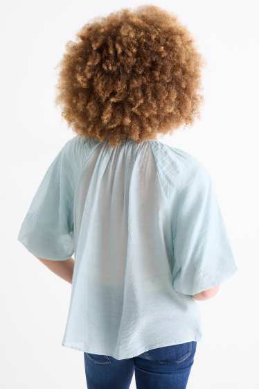 Women - V-neck blouse - light blue
