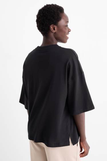 Dámské - Tričko - oversized - s lesklou aplikací - černá
