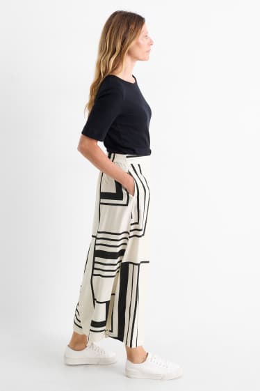 Dames - Pantalon - high waist - wide leg - met patroon - wit / zwart