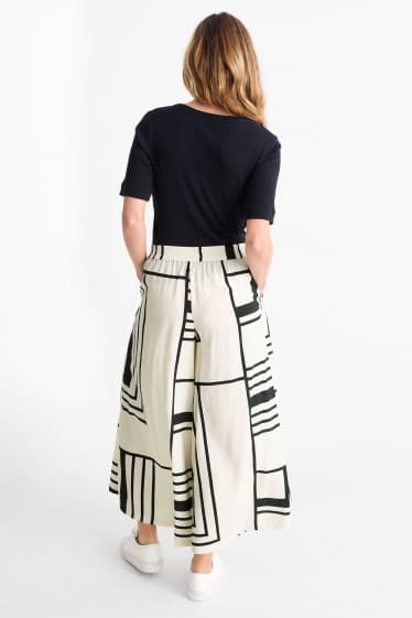 Dames - Pantalon - high waist - wide leg - met patroon - wit / zwart