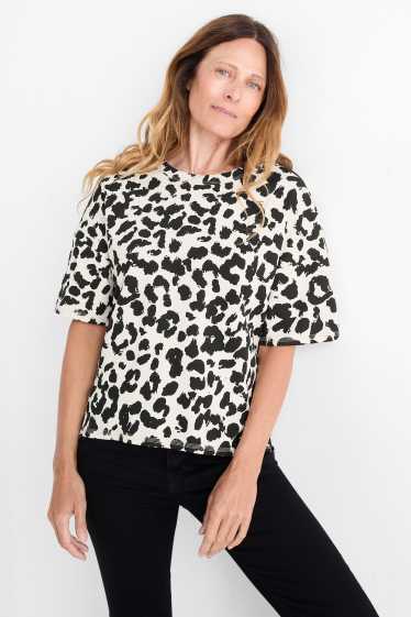 Dona - Samarreta bàsica de mànigues curtes - oversized- estampat de lleopard - negre/beix