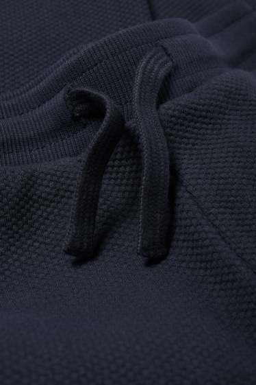 Kinderen: jongens - Joggingbroek - met structuur - donkerblauw